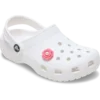 Bijoux Jibbitz « Fleur rose avec perle au centre »