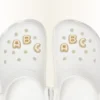 Bijoux Jibbitz « Lettre a bulle dorée »